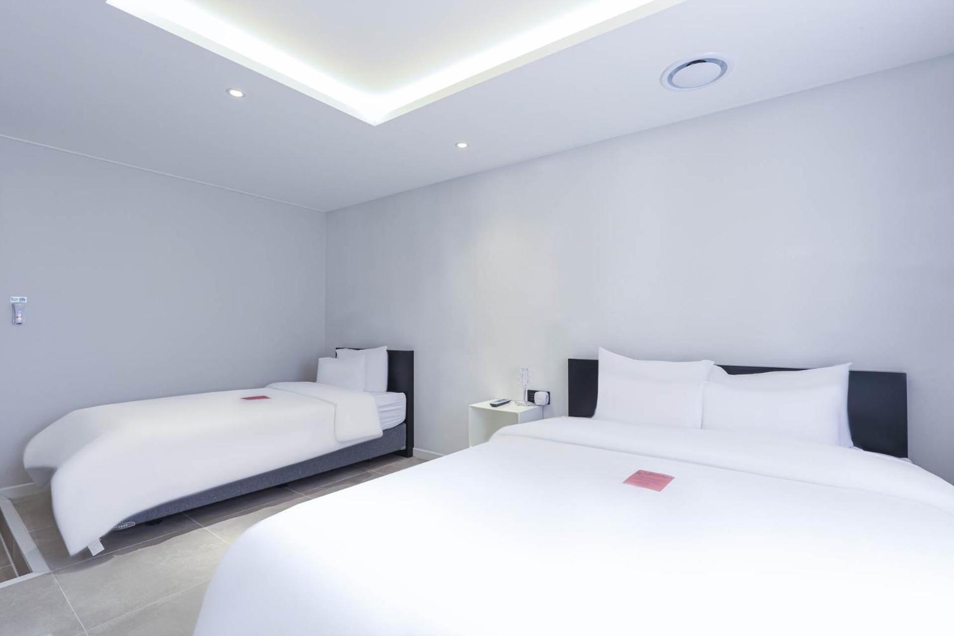 Hotel Hongdan Songjŏng-ni Habitación foto