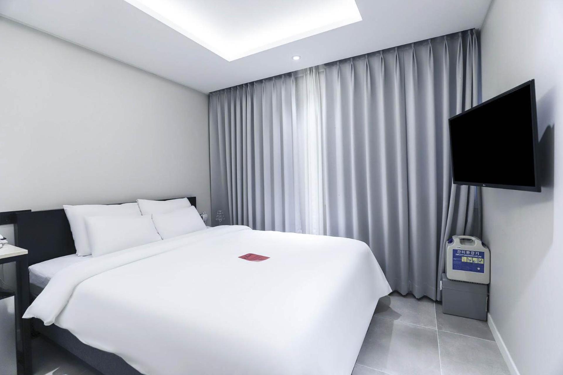 Hotel Hongdan Songjŏng-ni Habitación foto