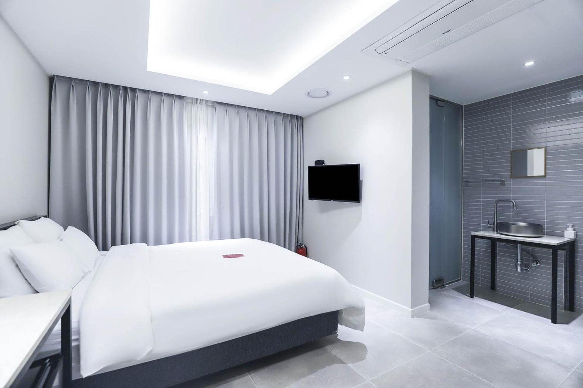Hotel Hongdan Songjŏng-ni Habitación foto